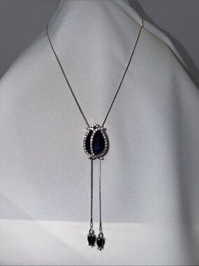 Silver Rose Necklace with Dark Blue Stone